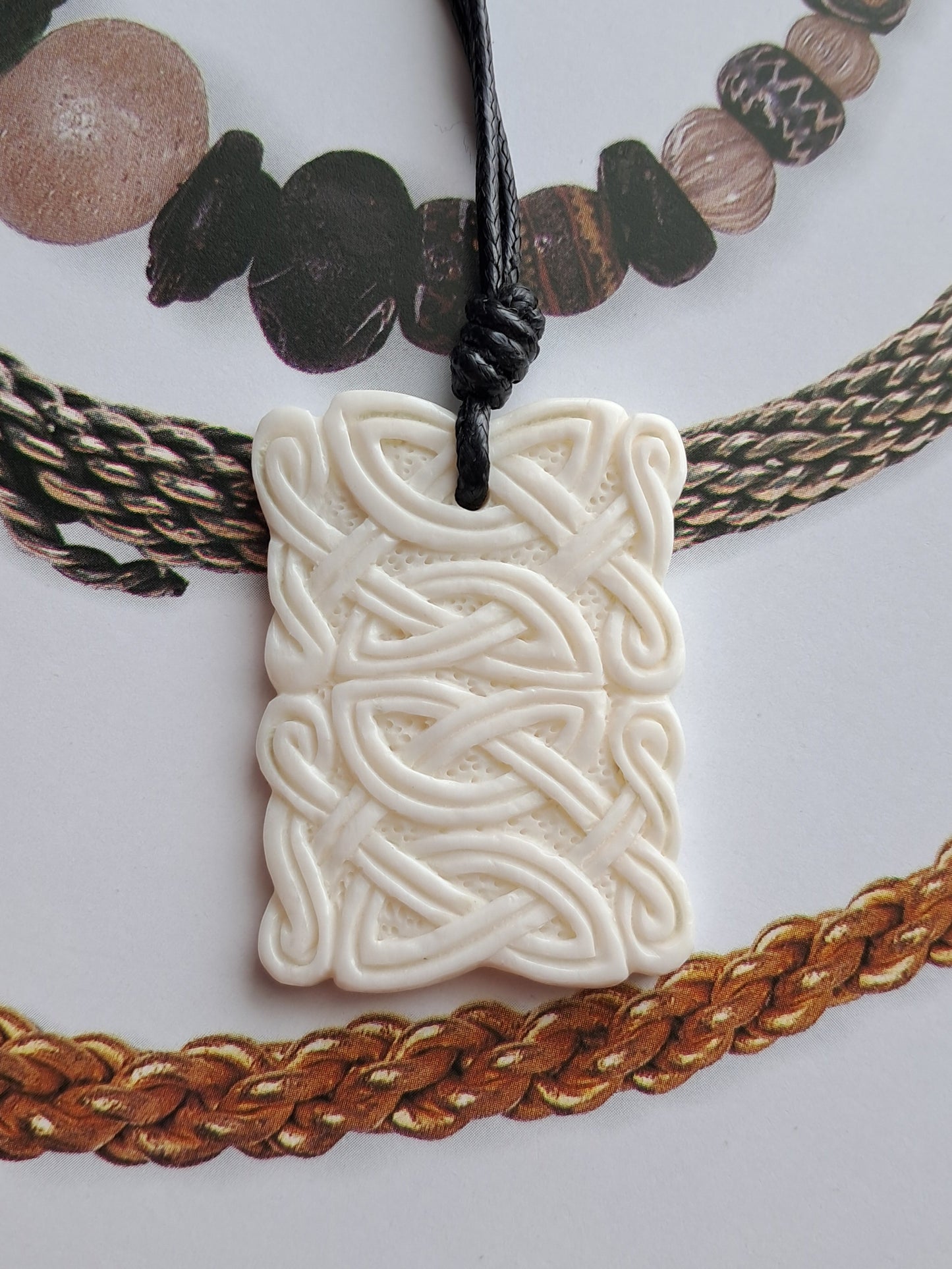Hand-Carved Celtic–Norse Knotwork Pendant in Natural Bone, Historical Design