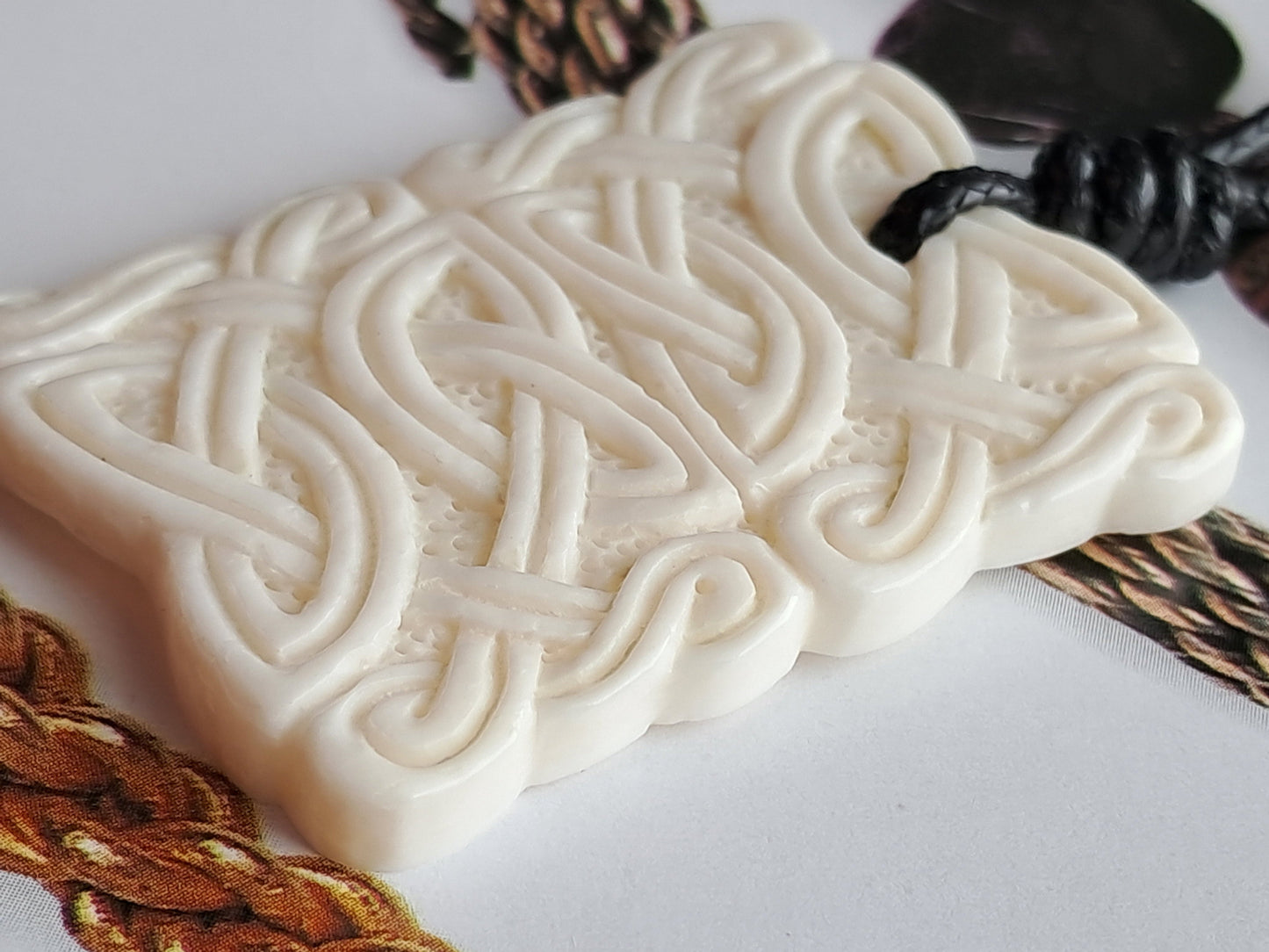 Hand-Carved Celtic–Norse Knotwork Pendant in Natural Bone, Historical Design