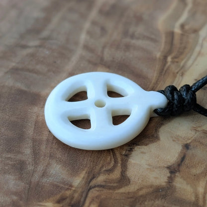 Sun Cross Pendant – Hand-Carved Bone or Horn Amulet