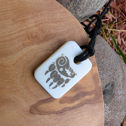 Handmade Bear Paw Pendant – Bone Necklace with Etched Design