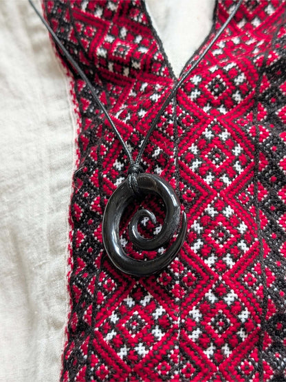 Celtic Spiral Pendant – Hand-Carved Black Horn Amulet