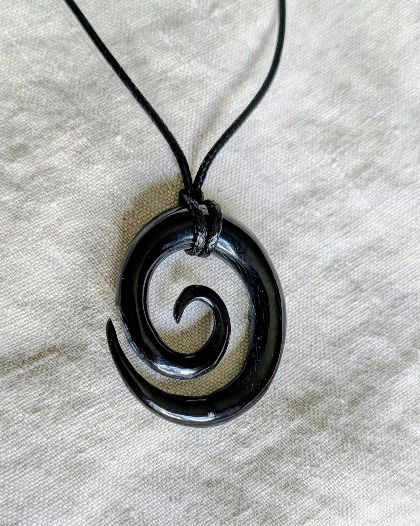 Celtic Spiral Pendant – Hand-Carved Black Horn Amulet