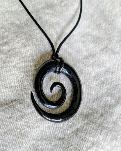 Celtic Spiral Pendant – Hand-Carved Black Horn Amulet
