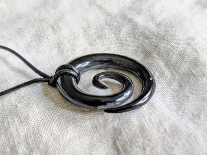 Celtic Spiral Pendant – Hand-Carved Black Horn Amulet