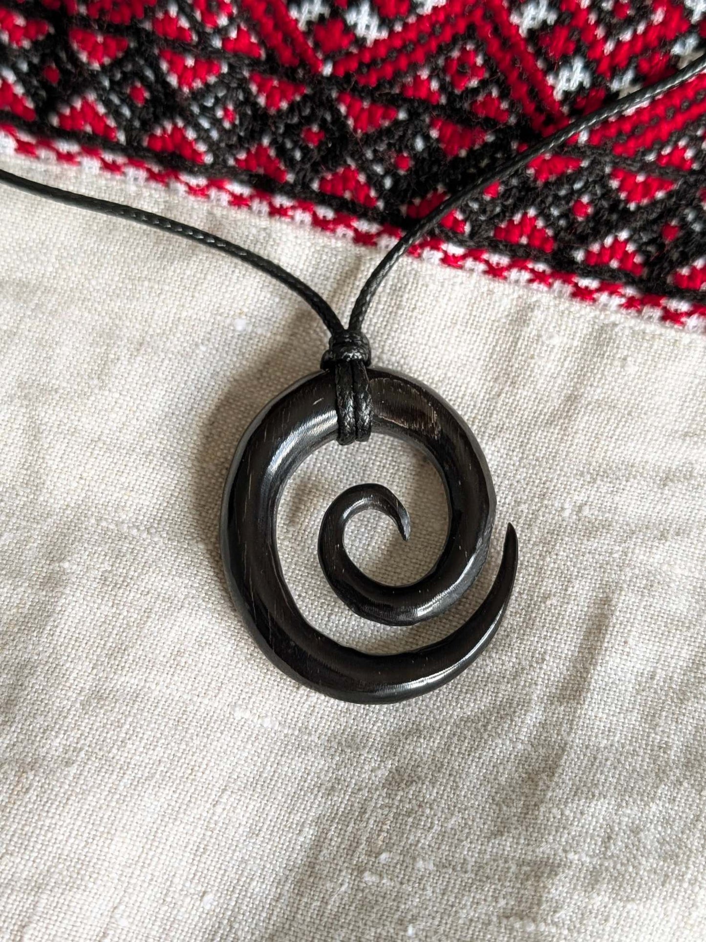 Celtic Spiral Pendant – Hand-Carved Black Horn Amulet