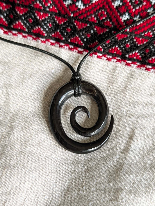 Celtic Spiral Pendant – Hand-Carved Black Horn Amulet