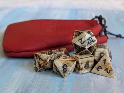 Hand-Carved DnD avDice Set in Patinated Bone with Leather Bag – Natural RPG Dice