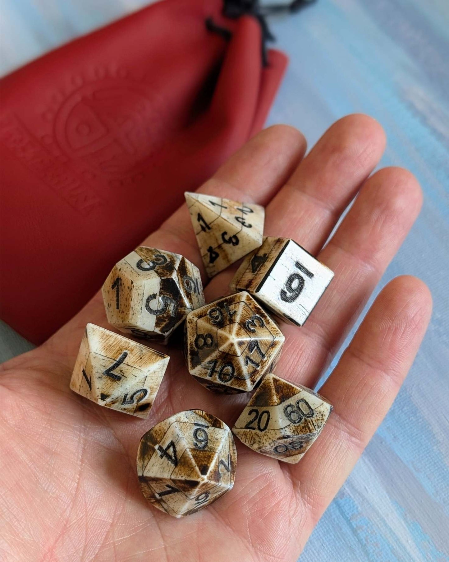Hand-Carved DnD avDice Set in Patinated Bone with Leather Bag – Natural RPG Dice