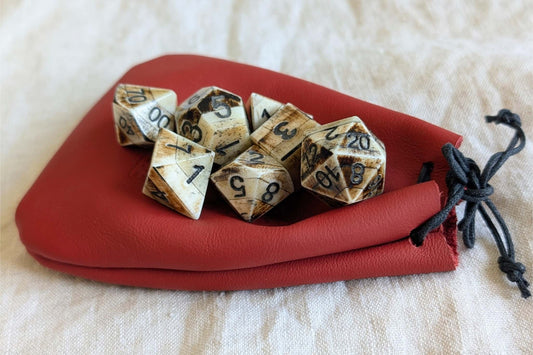 Hand-Carved DnD avDice Set in Patinated Bone with Leather Bag – Natural RPG Dice