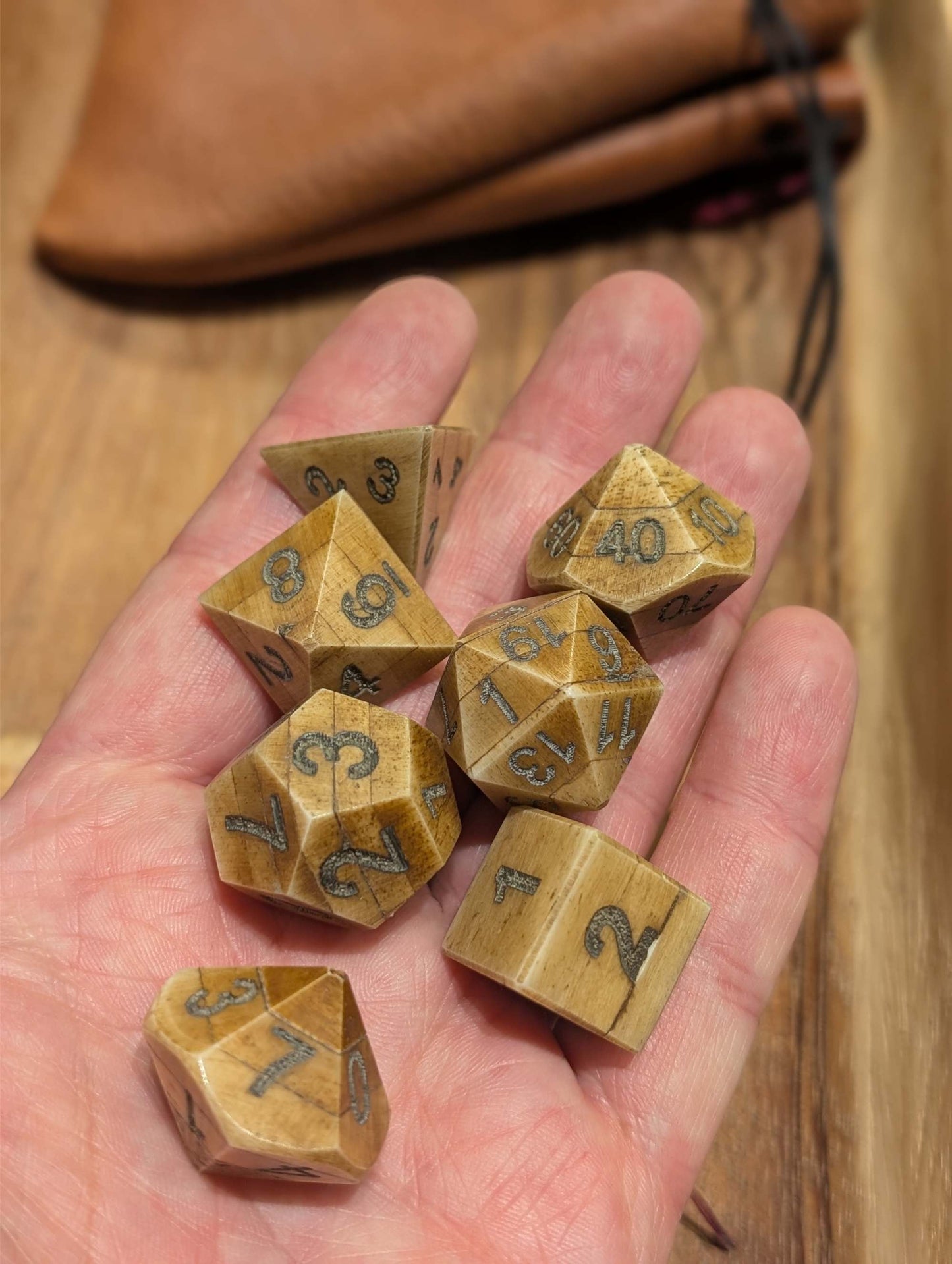 Hand-Carved DnD Dice Set in Patinated Bone with Leather Bag – Natural RPG Dice