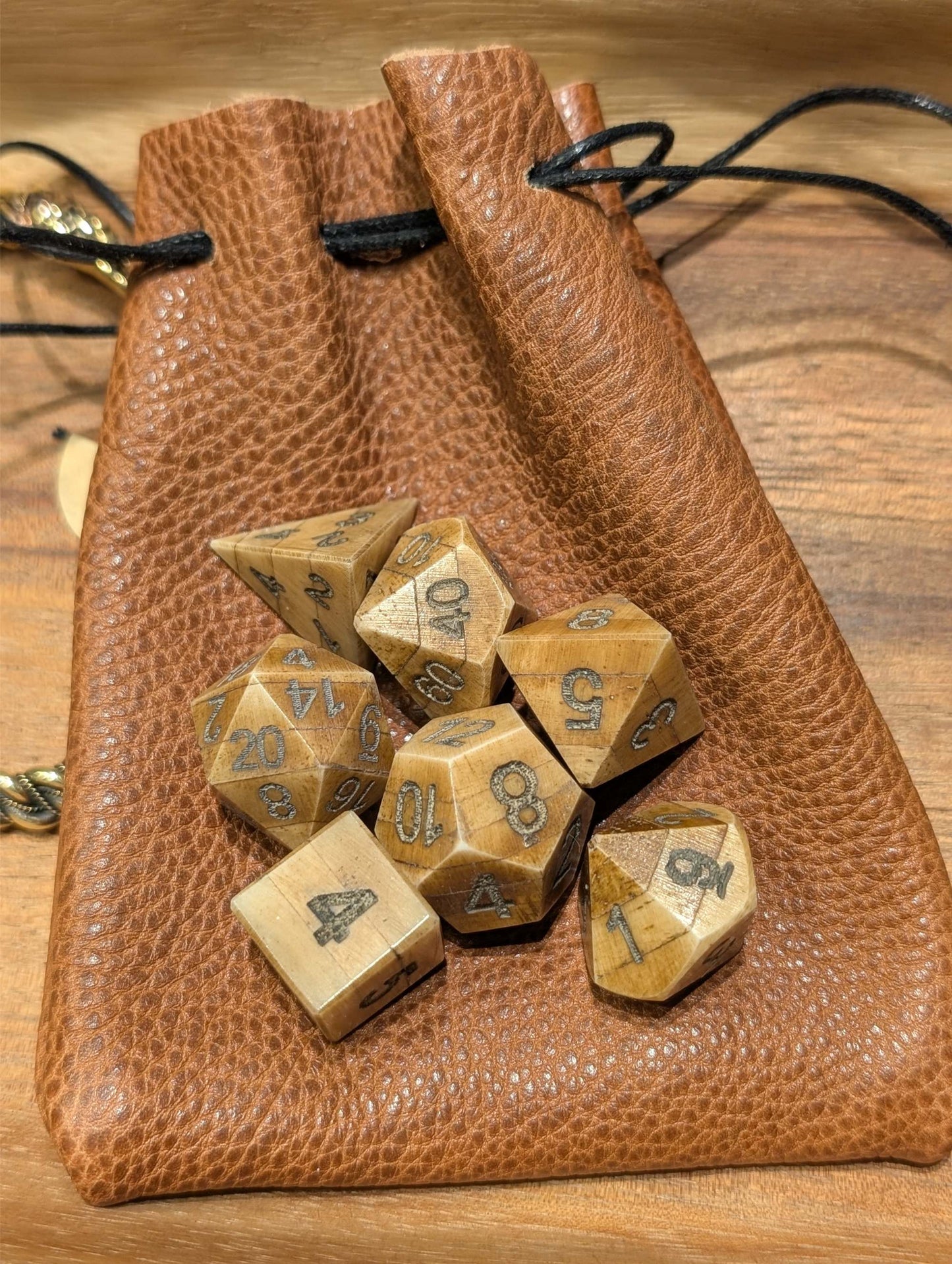 Hand-Carved DnD Dice Set in Patinated Bone with Leather Bag – Natural RPG Dice