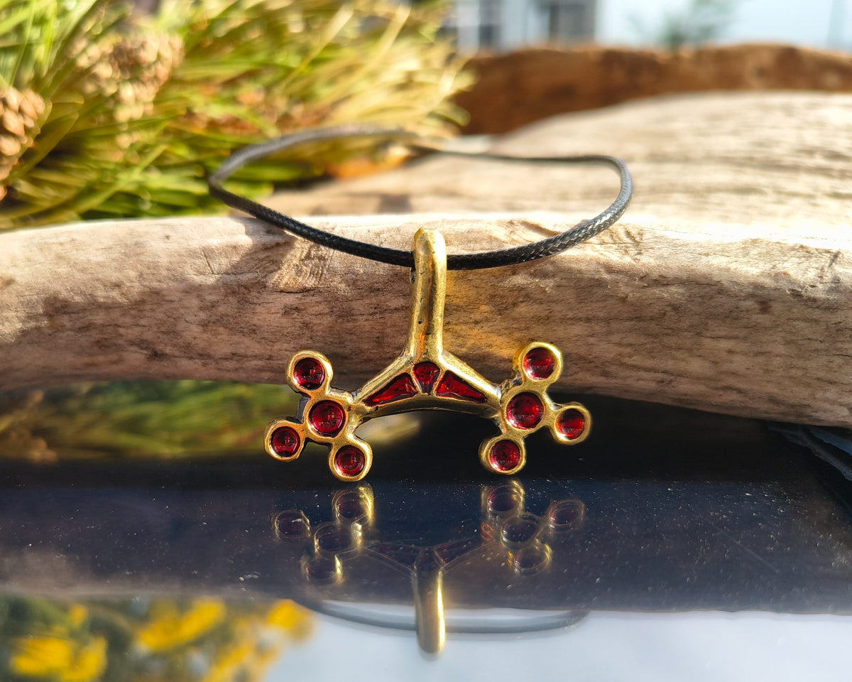 roman moon pendant in red enamel and brass