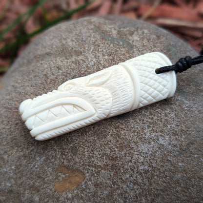 Norse Wolf Bone Pendant with Ansuz Rune, Hand-Carved Amulet