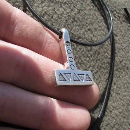 Silver Mjolnir Necklace – Handcrafted Thor’s Hammer with Wolf Tooth and Solar Symbols