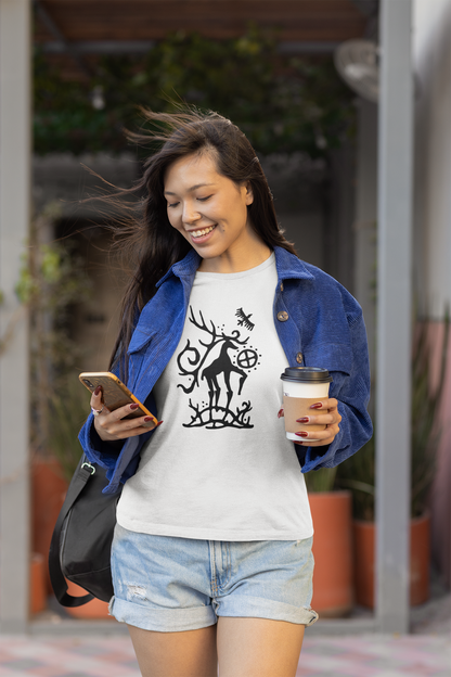 Horned God of Celts / Woman walking outdoors, holding a phone and a coffee cup, wearing a white t-shirt with a black  Celtic design.