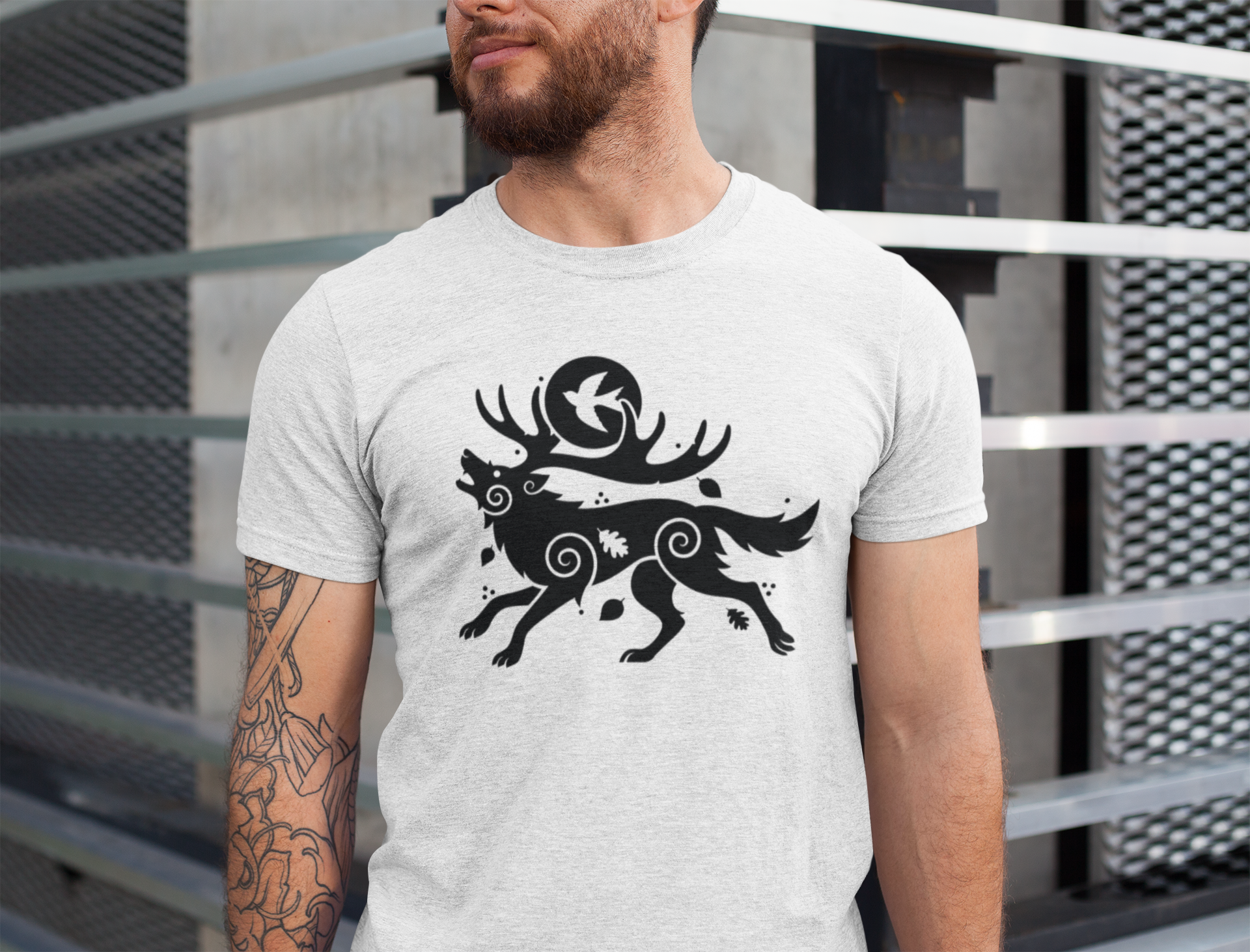 LostRavn Fashion Guardian of Forest T-shirt / Man wearing a gray t-shirt with a black graphic design of a deer and bird on a metal background